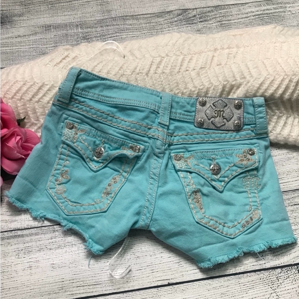 Miss Me woman’s teal cut off shorts